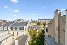 EXCEPTIONAL – TOP FLOOR WITH UNINTERRUPTED VIEWS OF THE MUSÉE D'ORSAY – CONTINUOUS BALCONY – PARIS 7TH ARRONDISSEMENT
