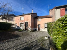 Maison de 75 m2 avec garage  et jardin. 