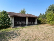 Maison de 107m2 avec double  garage et 3663 m2 de terrain 