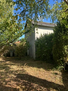 Maison bourgeoise de 8 pièces avec jardin, garage et dépendances