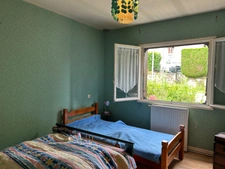 Maison à vendre 4 pièces LUSSAC LES EGLISES (87) sur grand jardin clos de 1954m2 proche ruisseau.