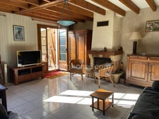 Maison de charme de 106 m2 habitable avec garages, atelier et jardin 
