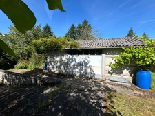 Maison à vendre 4 pièces LUSSAC LES EGLISES (87) sur grand jardin clos de 1954m2 proche ruisseau.