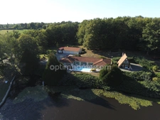 Très belle Propriété de  6,7hectares avec maison de plain-pied de 200m2, plan d'eau, gîte et dépendances 