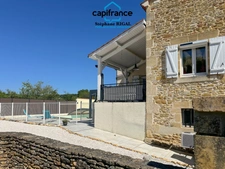 Maison en pierre à vendre 6 pièces FUMEL (47) de 120m2 environ avec piscine et garage.