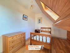 CLÉDER – Propriété familiale en bord de mer avec vaste terrain constructible de 4200 m²