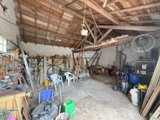 Maison de village de  130 m² avec garage, atelier indépendant et jardin paysager 