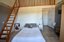 BARJAC – A 210 m2 property including a 70 m2 apartment with panoramic views of the Cévennes mountains, a short walk from the heart of the village