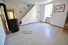 BARJAC – Maison de village soigneusement rénovée – 66 m² – Garage voûté