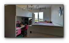 A vendre maison de plain-pied RT2012 de 84 m² avec 3 chambres, jardin et carport
