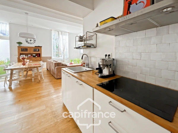 BORDEAUX (33) Appartement duplex avec jardin privatif de 100 m²