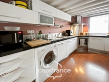 On the outskirts of Bordeaux/Talence (33), in the Caudérès district, a house renovated by an architect with a garden.