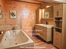 In the heart of the village, charming house with enclosed garden