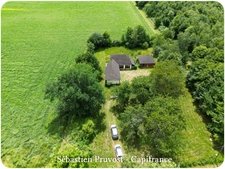 Maison à vendre 4 pièces JUMILHAC LE GRAND (24) Plain-pied 111m2, terrain 3479m2, garage 40m2, deux chambres et mezzanine