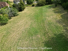 Terrain à vendre  NANTHIAT (24), ensemble foncier, terrain avec CU et bois secteur bourg, bassin sur le terrain. 9839m2