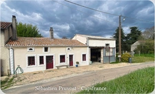 Maison rénovée à vendre 3 pièces CONNEZAC (24), deux chambres, grange 63m2, terrain 7290m2 dont partie à bâtir.