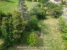 Terrain à vendre  NANTHIAT (24), ensemble foncier, terrain avec CU et bois secteur bourg, bassin sur le terrain. 9839m2