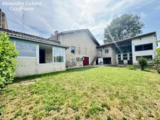 Maison en pierres - 3 chambres -  vaste jardin et grand garage
