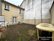 LANGON CENTRE VILLE - Immeuble en pierres 450 m² comprenant 6 appartements et 2 locaux commerciaux 