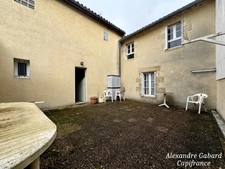 LANGON CENTRE VILLE - Immeuble en pierres 450 m² comprenant 6 appartements et 2 locaux commerciaux 