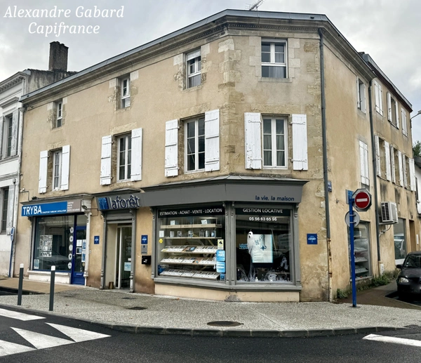 LANGON CENTRE VILLE - Immeuble en pierres 450 m² comprenant 6 appartements et 2 locaux commerciaux 