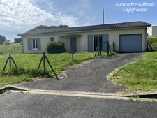 Maison de plain-pied - 3 chambres - Jardin - Garage