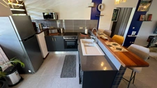 Splendide appartement T2  vue mer et massif du Rorota  à Rémire Montjoly vendu entièrement meublé et décoré