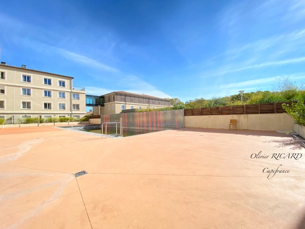 Dpt Hérault (34), à vendre JUVIGNAC Appartement T3 de 66,89 m2 dans résidence avec piscine 