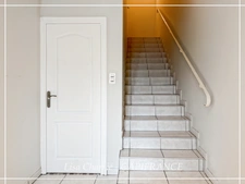 Townhouse for sale in Vic-Fezensac (32), divided into 2 rented apartments, with terrace, balcony, and garage.