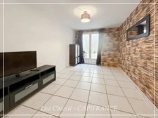 Townhouse for sale in Vic-Fezensac (32), divided into 2 rented apartments, with terrace, balcony, and garage.
