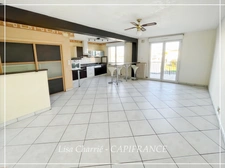 Townhouse for sale in Vic-Fezensac (32), divided into 2 rented apartments, with terrace, balcony, and garage.