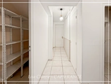 Townhouse for sale in Vic-Fezensac (32), divided into 2 rented apartments, with terrace, balcony, and garage.