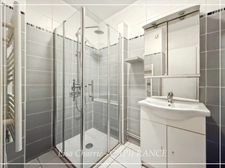 Townhouse for sale in Vic-Fezensac (32), divided into 2 rented apartments, with terrace, balcony, and garage.