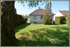Maison sur sous-sol avec jardin clos – 3 chambres, balcon et cheminée