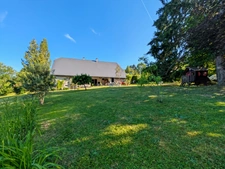 À vendre 8 pièces CERCIER (74) Authentique corps de ferme de caractère entièrement rénové avec piscine et vaste terrain arboré