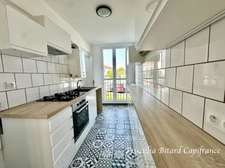 Appartement T4 en rez-de-chaussée avec jardin privatif et cave
