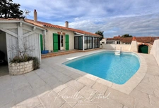 Une maison aux volumes rares avec sous-sol total, garage XXL et fort potentiel d’aménagement !