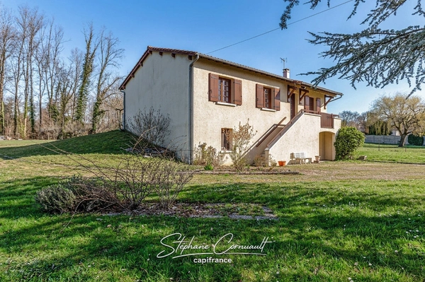 Maison de 90 m² avec jardin arboré
