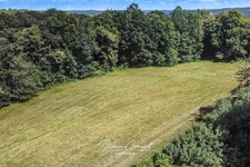 Maison en pierre de 157m² avec 6,3ha de bois et prairies