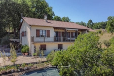 Maison de 115 m² avec grand terrain arboré