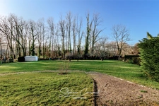 House of 90 m² with a garden with trees