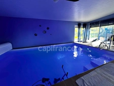  Maison spacieuse avec jardin fleuri et piscine intérieure LANDEDA (29)