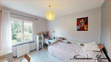 Maison spacieuse avec 3 chambres et véranda proche du centre-ville et des écoles – 197 600 €