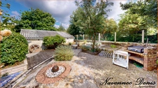Maison spacieuse avec 3 chambres et véranda proche du centre-ville et des écoles – 197 600 €