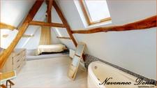 Maison de charme avec 3 chambres et garage proche du centre-ville et des écoles – 220 000€