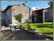 2 maisons en pierre + dépendances