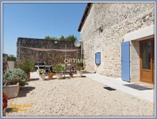 ensemble de 2 maisons en pierre + grand terrain 