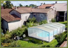 2 maisons en pierre + dépendances