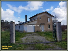 ensemble de 2 maisons+ dependances + grand terrain + étang 