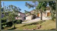 ensemble de 2 maisons en pierre + grand terrain 